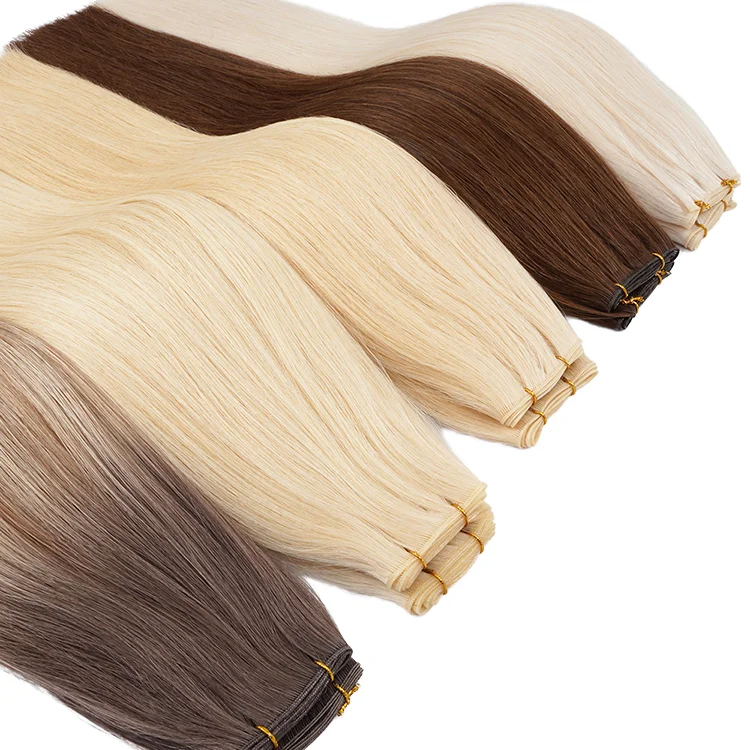 2.2 Genius weft hair extensions in blonde and brunette shades